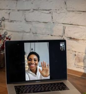 Therapist saying hello during an online therapy session in New Jersey