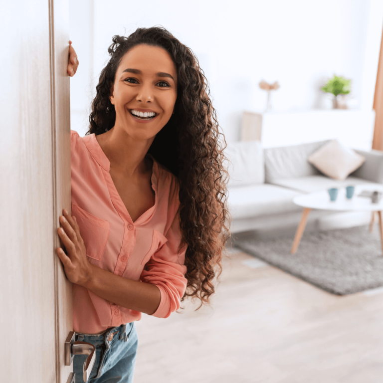 woman opening door for in home therapy in New Jersey
