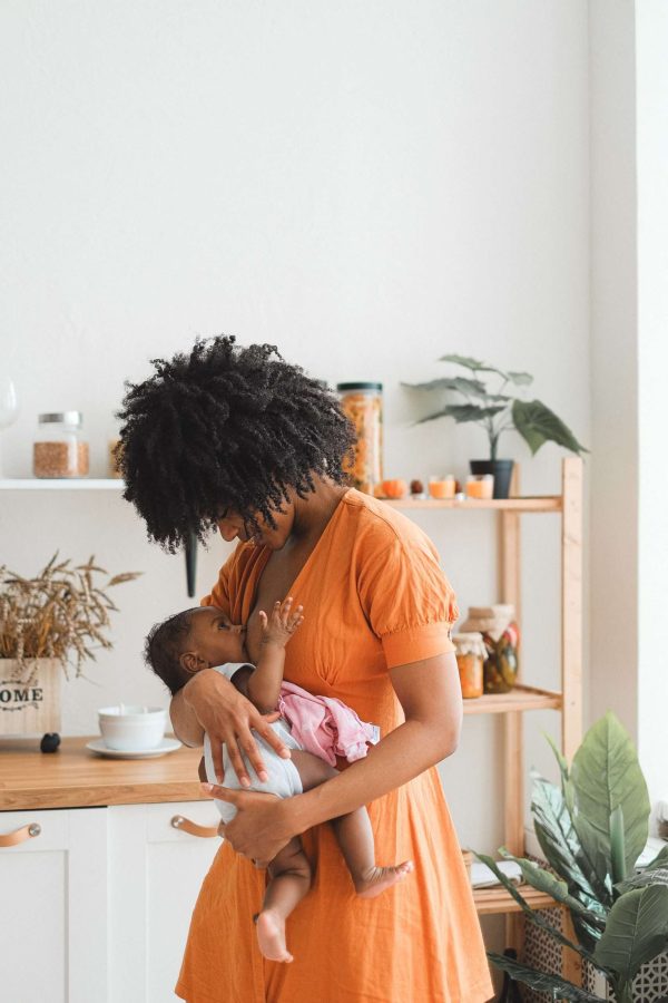 new mom nursing baby, happy and bonding through online therapy support in new jersey